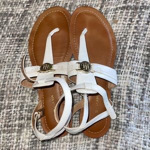 White with gold clasps and gold accent pendant sandals.